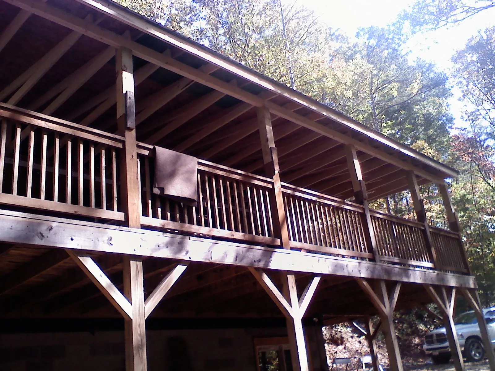 Timber framing under a new elevated porch and deck — Roof Leak Repair in Steep Falls by Roofing Brothers